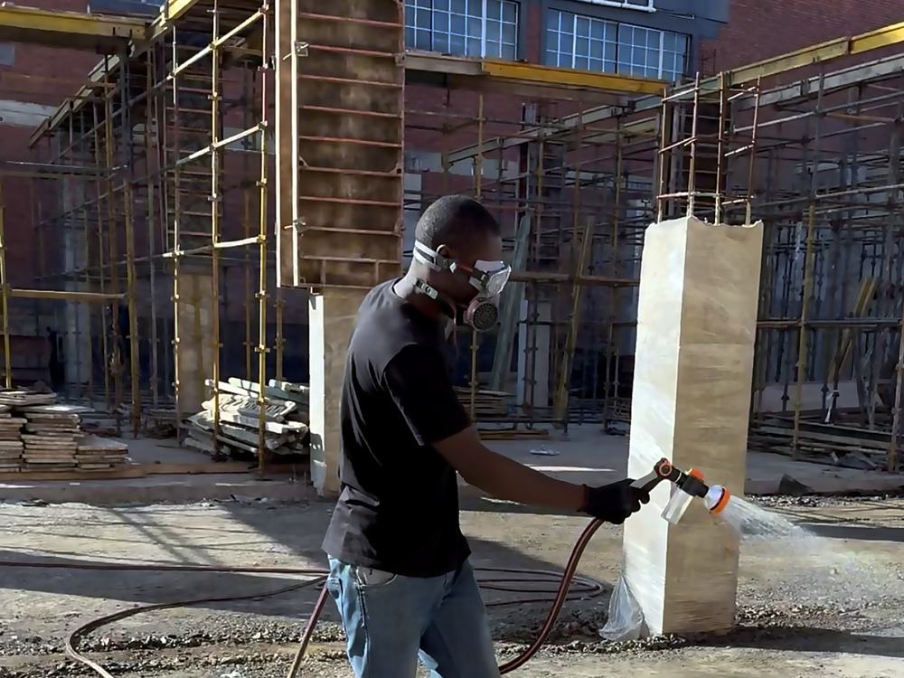 Operator treating a commercial construction site near Umhlanga